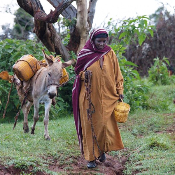 Tumme and Bukke collect water, Ethiopia