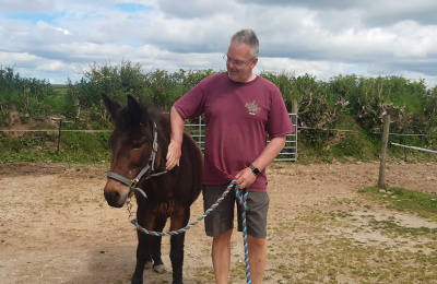 Woody the mule, with Guardian, Gene